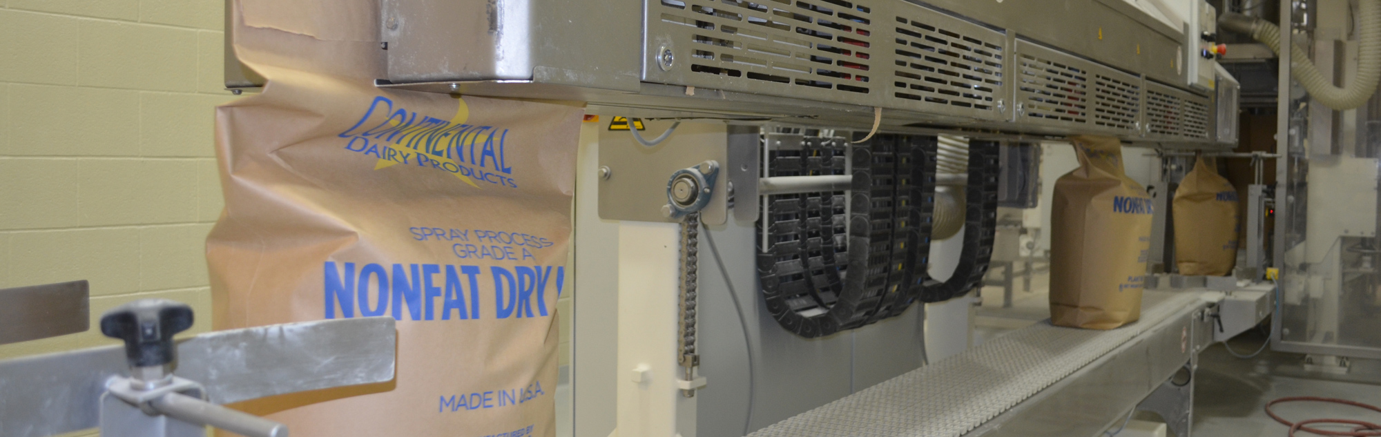 bags of Continental nonfat dry milk